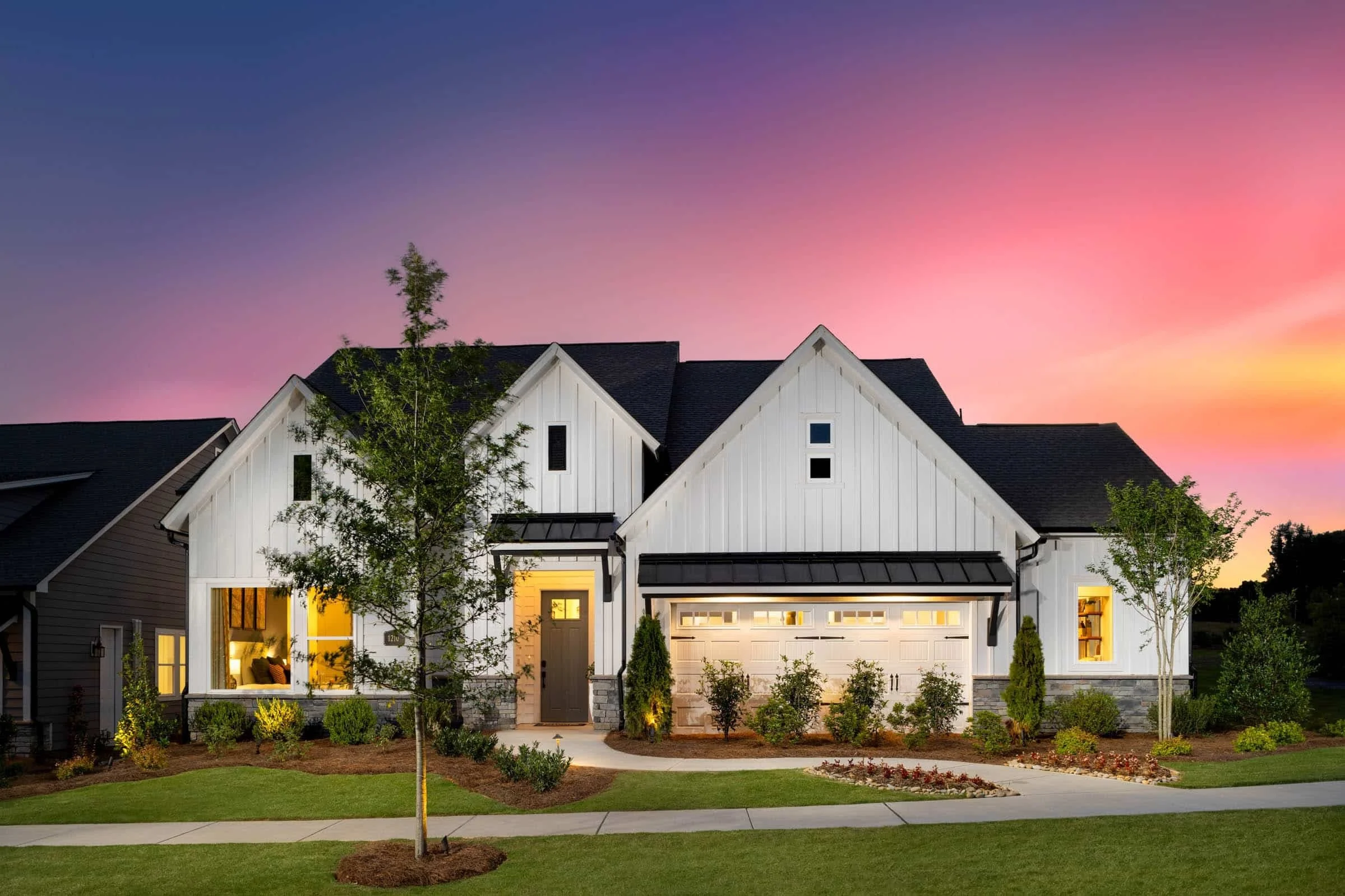 encore-at-streamside-harwin-model-home-exterior-at-sunset-active-adult-community-waxhaw-nc.jpg