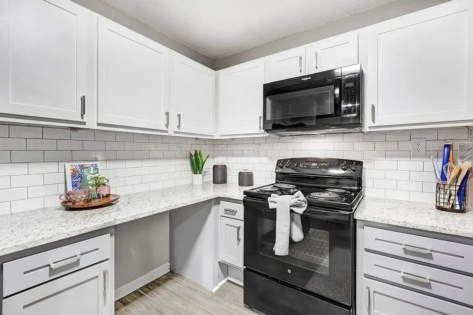 polo-club-at-weddington-white-kitchen-with-subway-tile-backsplash-active-adult-community-weddington-nc.jpg