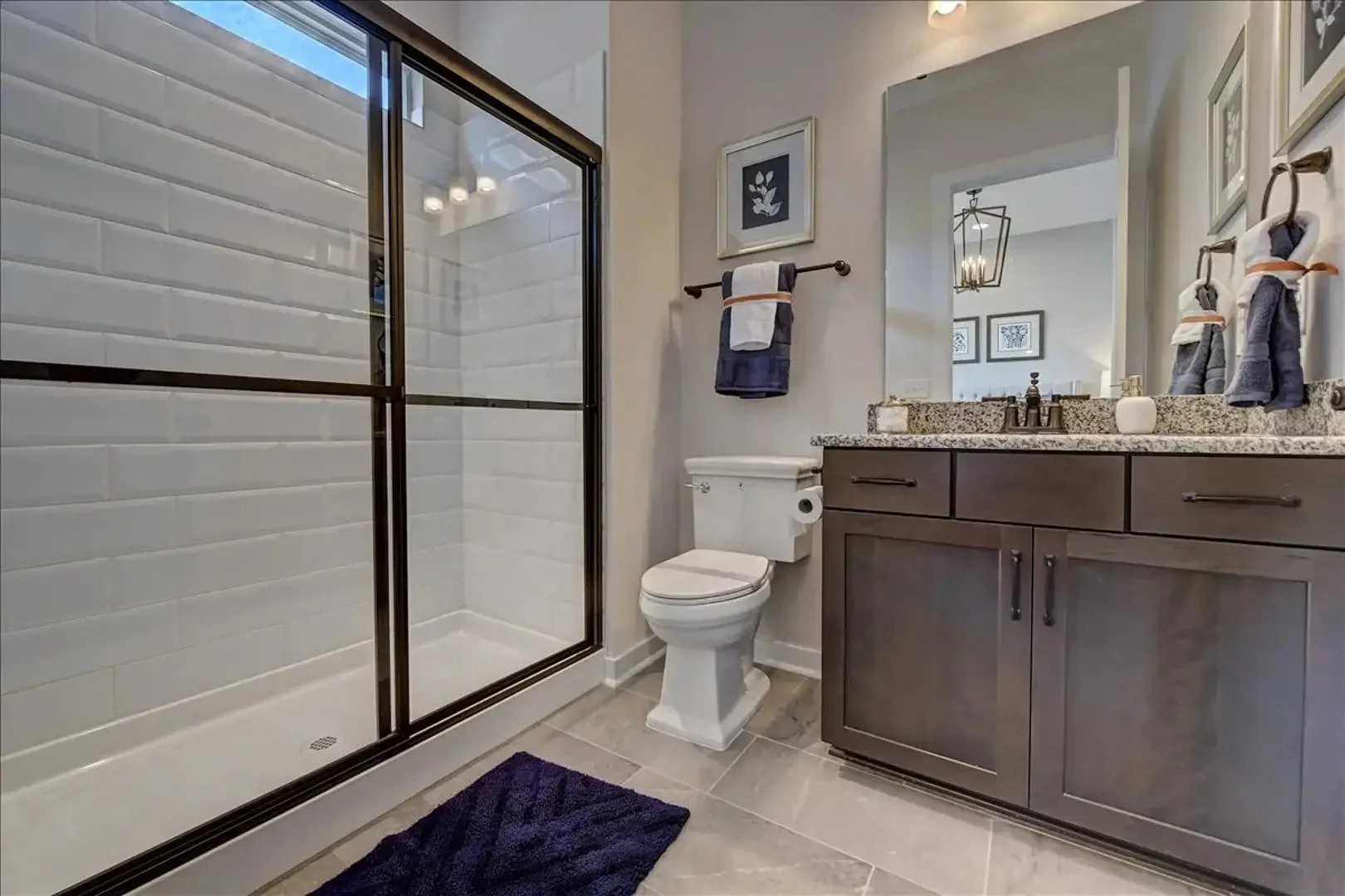 pinnacle-at-wesley-chapel-bathroom-with-glass-shower-and-double-vanity-active-adult-community-wesley-chapel-nc.jpg
