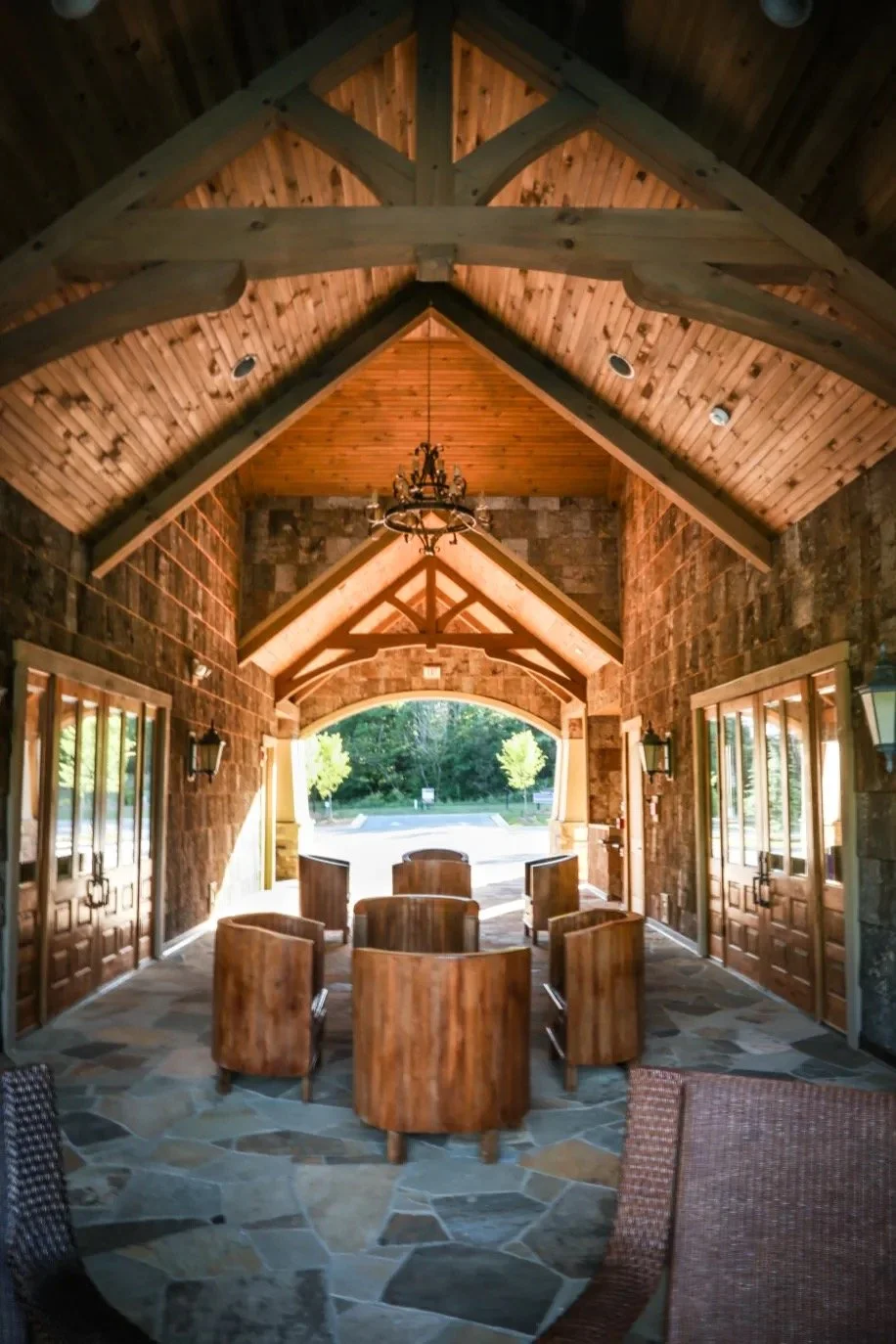 tree-tops-lancaster-clubhouse-interior-covered-porch-with-stone-walls-and-wood-ceiling-lancaster-sc.jpg