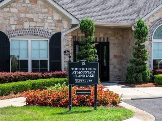 polo-club-at-mountain-island-lake-amenity-center-sign-and-clubhouse-exterior-active-adult-community-charlotte-nc.jpg