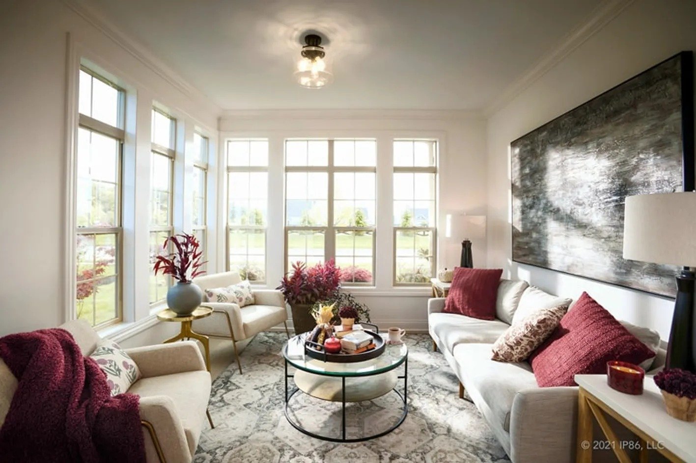 the-courtyards-at-lake-davidson-bright-sunroom-with-sofas-and-large-windows-active-adult-community-davidson-nc.jpg