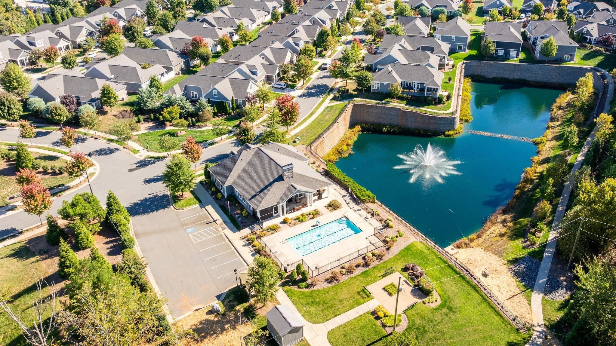 the-courtyards-on-lake-norman-aerial-view-of-clubhouse-pool-and-pond-active-adult-community-cornelius-nc.jpg