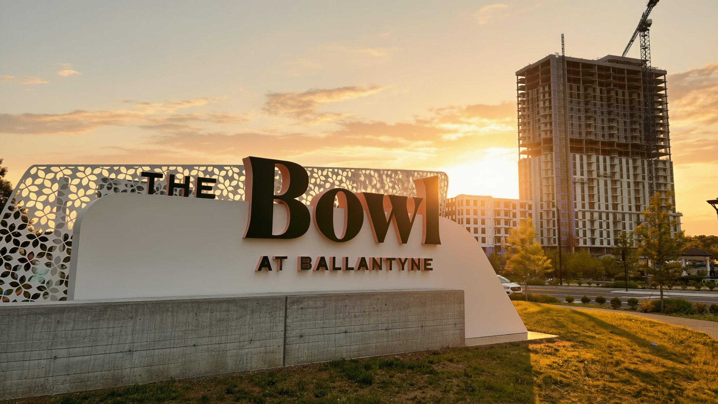 ballantyne-bowl-at-ballantyne-sign-and-high-rise-construction-at-sunset-charlotte-nc.jpg