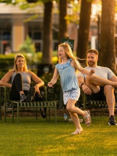 birkdale-village-children-running-on-village-green-huntersville-nc.jpg