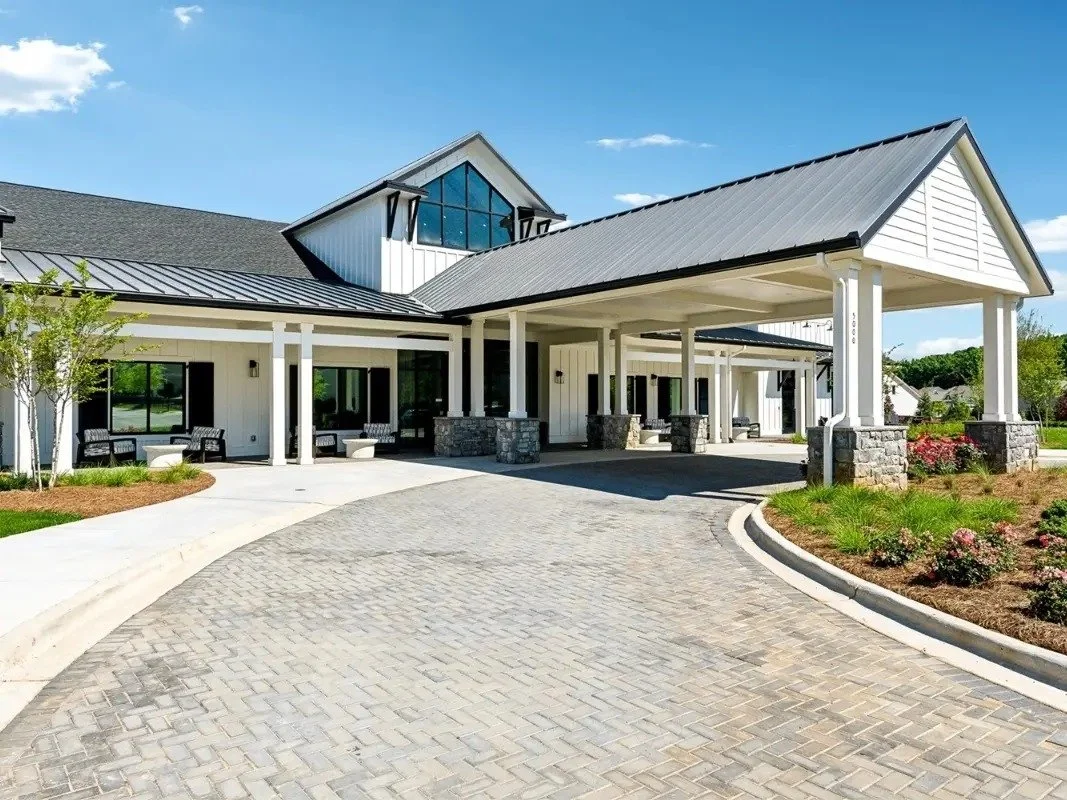 cresswind-at-wesley-chapel-clubhouse-front-porte-cochere-exterior-55-plus-community-wesley-chapel-nc.jpg