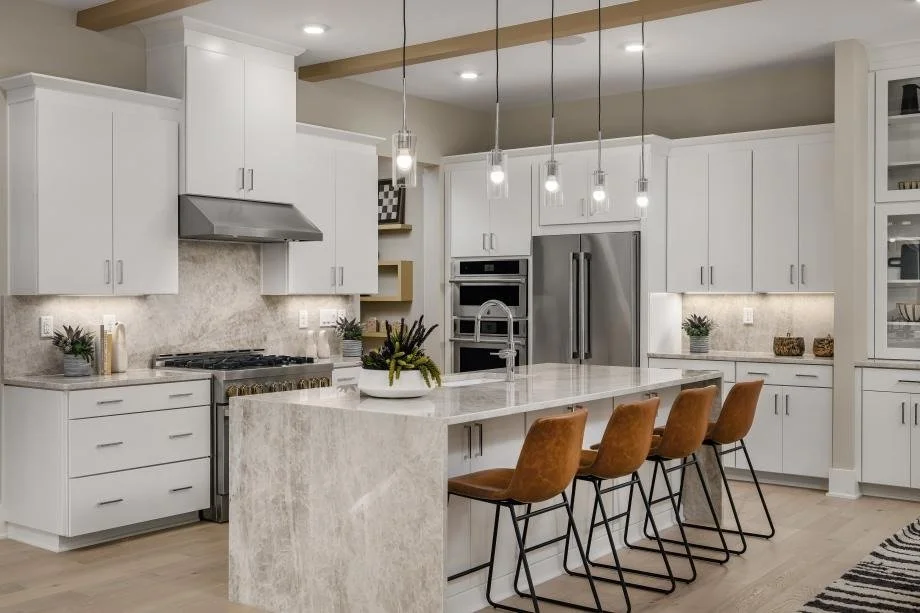 the-pines-at-sugar-creek-white-kitchen-with-large-island-new-home-community-fort-mill-sc.jpg