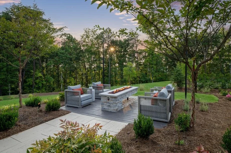the-pines-at-sugar-creek-wooded-backyard-patio-with-fire-pit-new-home-community-fort-mill-sc.jpg