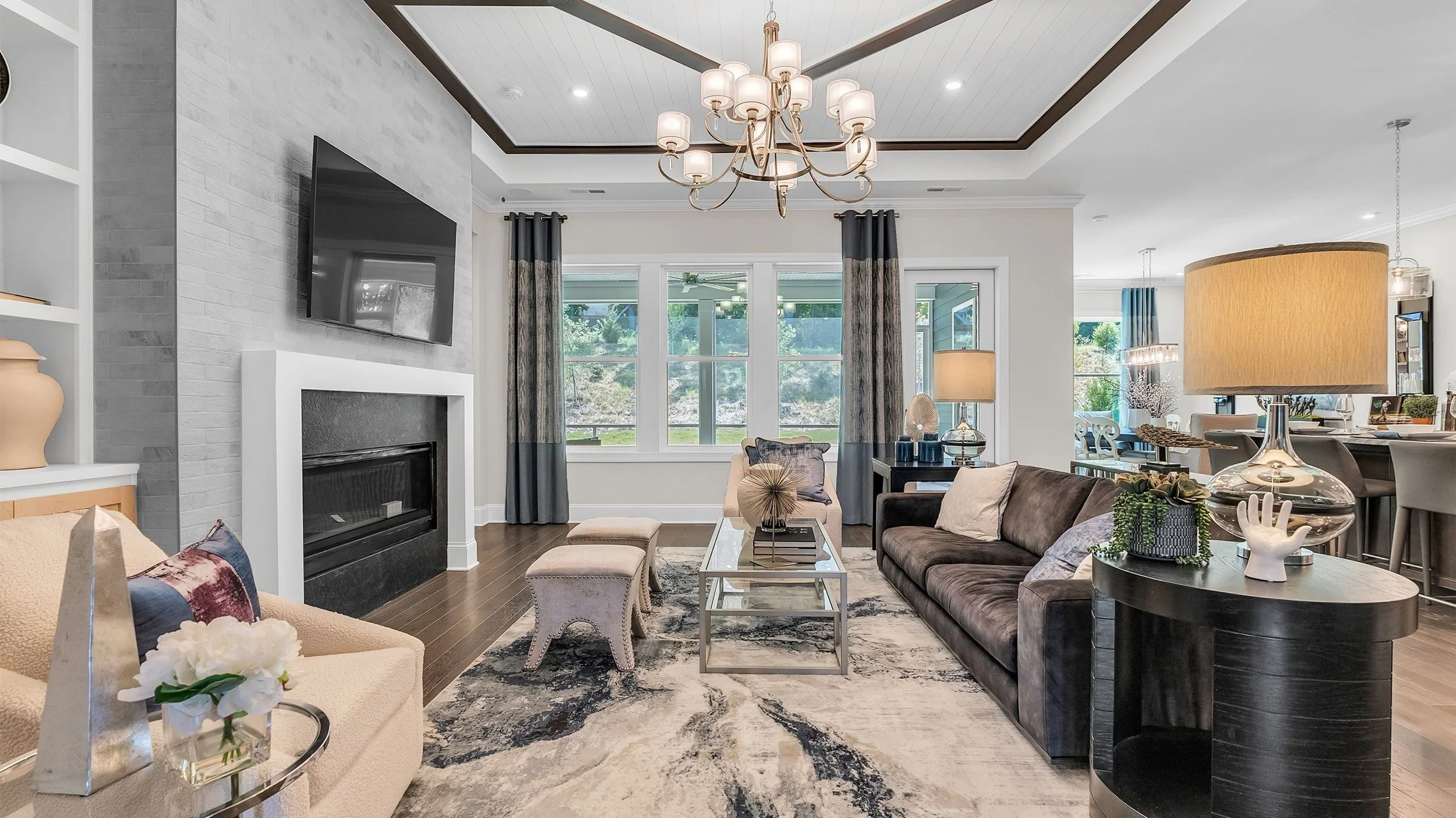 cresswind-at-wesley-chapel-nicole-model-great-room-with-fireplace-wide-view-55-plus-community-wesley-chapel-nc.jpg