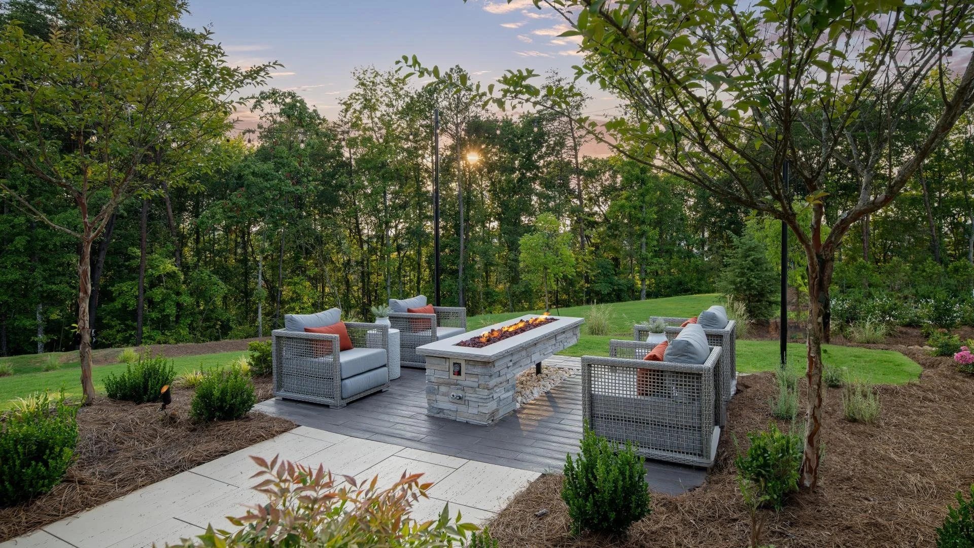 the-pines-at-sugar-creek-wooded-backyard-patio-with-fire-pit-wide-view-new-home-community-fort-mill-sc.jpg