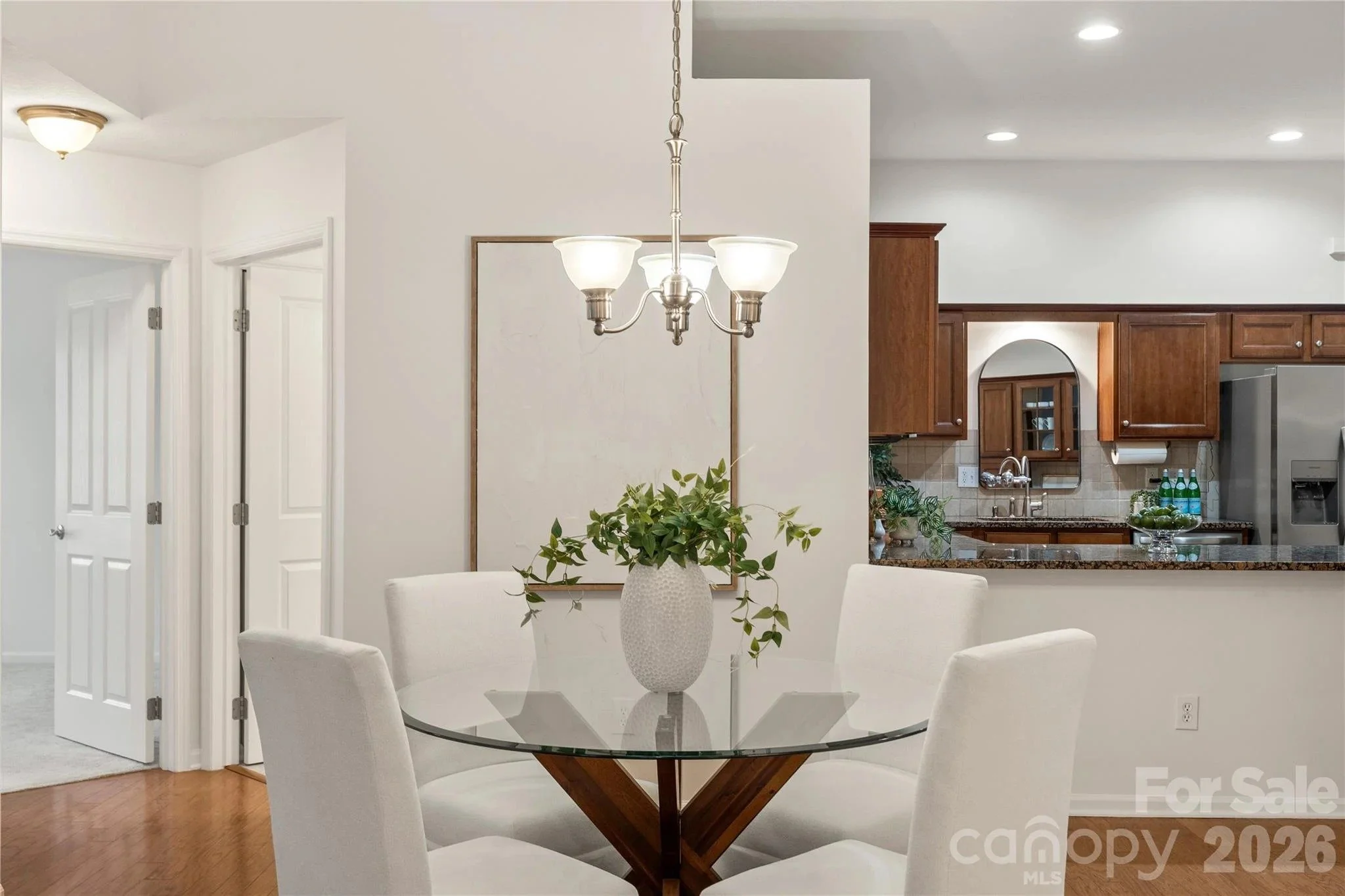 polo-club-at-weddington-dining-room-and-kitchen-interior-active-adult-community-weddington-nc.jpg