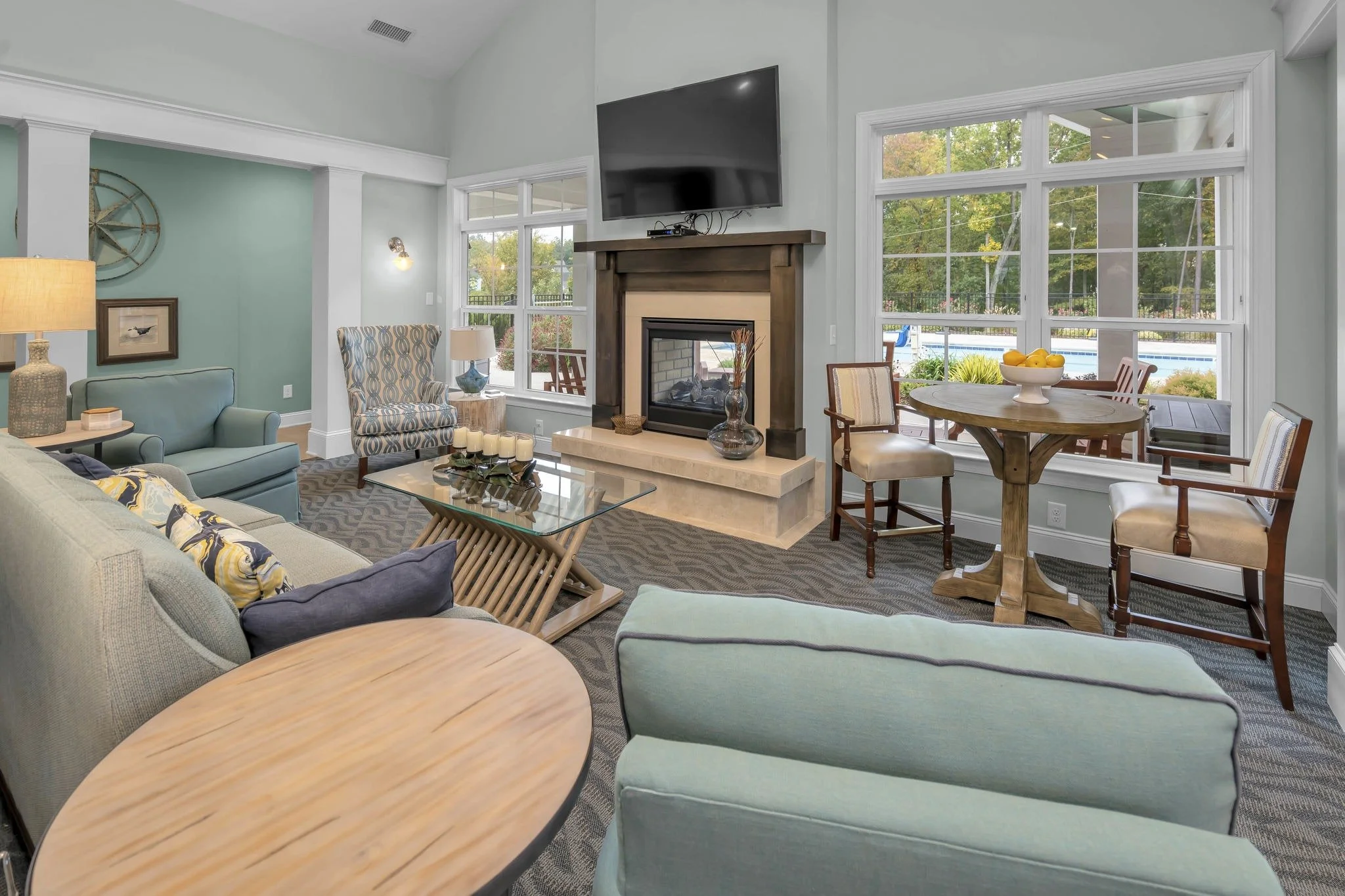 the-courtyards-on-lake-norman-clubhouse-great-room-with-fireplace-and-dining-area-active-adult-community-cornelius-nc.jpg