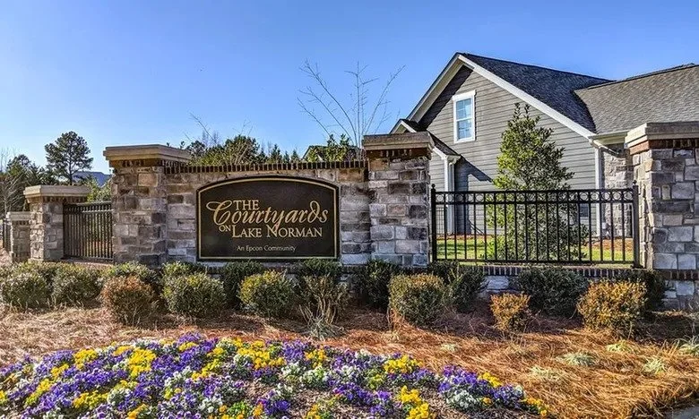 the-courtyards-on-lake-norman-community-sign-entrance-monument-with-flowers-active-adult-community-cornelius-nc.jpg