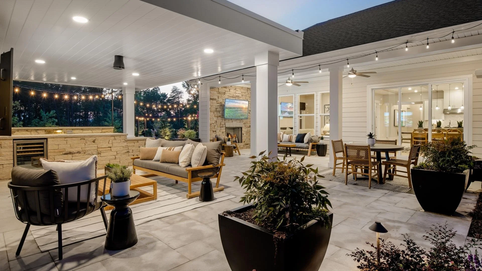 the-pines-at-sugar-creek-covered-backyard-patio-and-dining-area-wide-view-new-home-community-fort-mill-sc.jpg