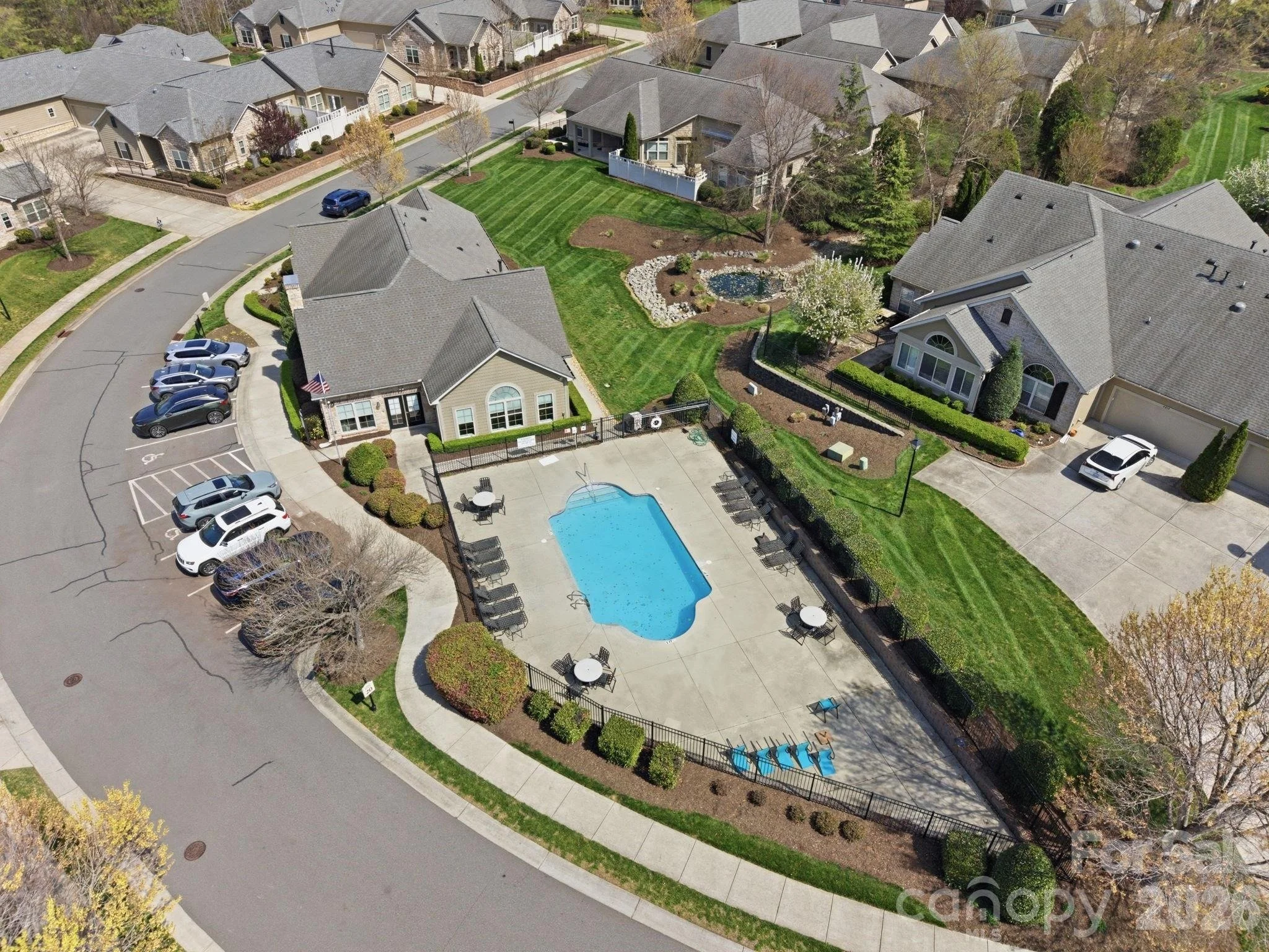 polo-club-at-mountain-island-lake-aerial-view-of-clubhouse-pool-and-parking-active-adult-community-charlotte-nc.jpg