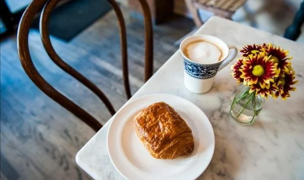 the-pines-at-sugar-creek-coffee-and-pastry-on-neighborhood-cafe-table-new-home-community-fort-mill-sc.jpg