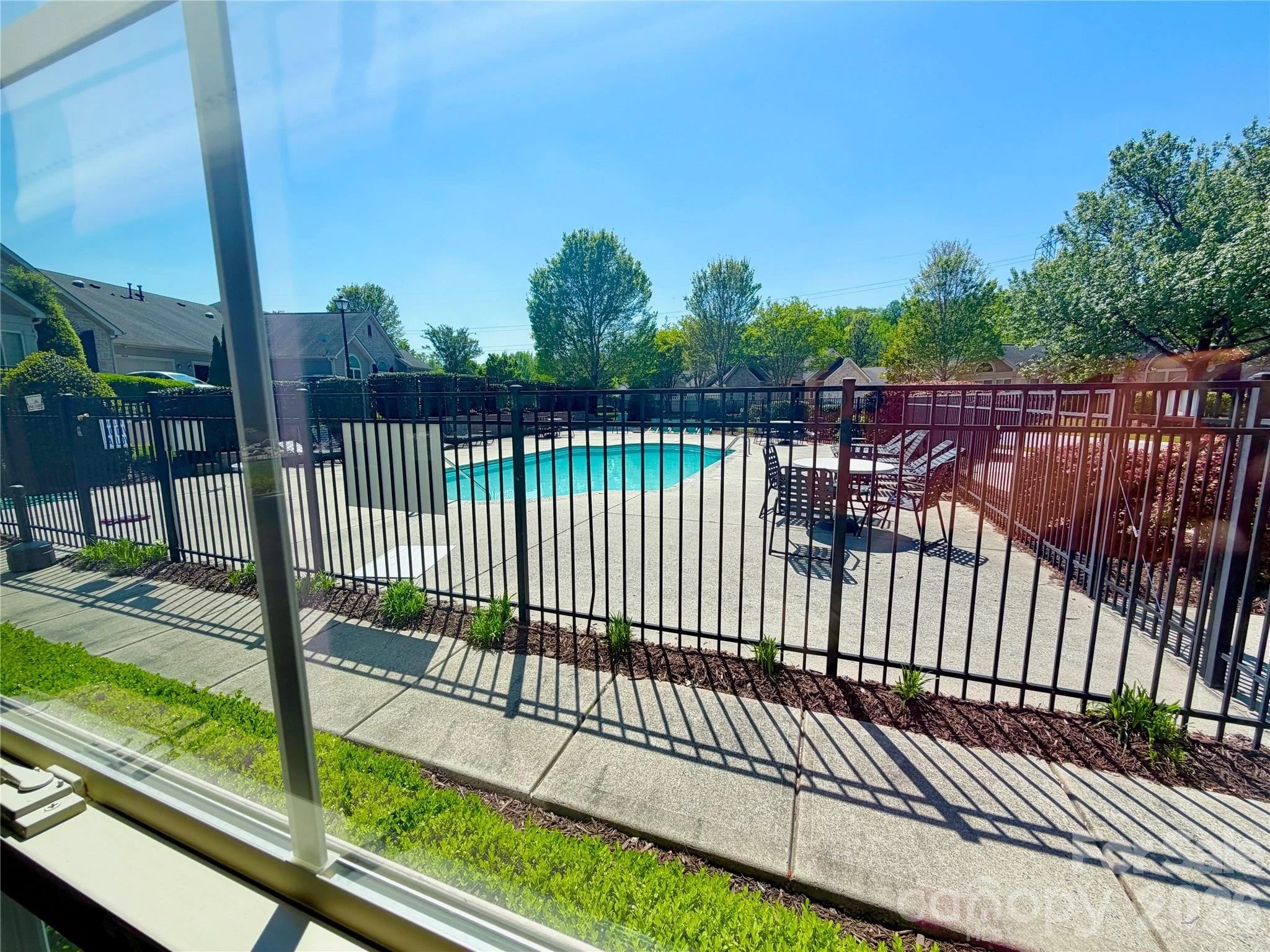polo-club-at-mountain-island-lake-pool-view-from-clubhouse-window-active-adult-community-charlotte-nc.jpg