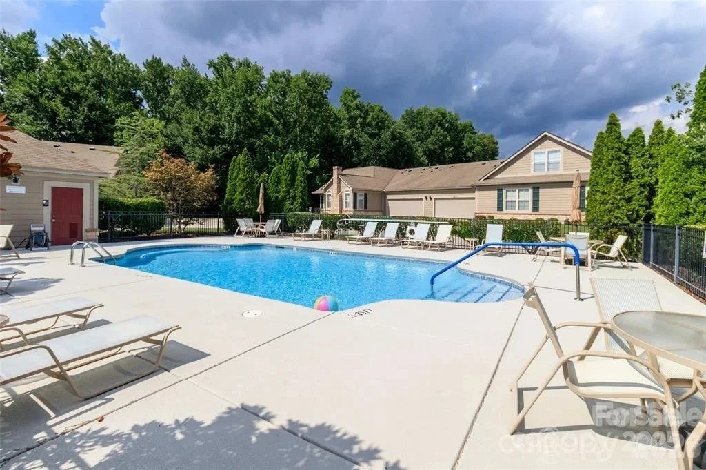 polo-club-at-weddington-community-pool-with-lounge-chairs-active-adult-community-weddington-nc.jpg
