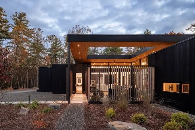 courtyards-of-marvin-modern-gated-entrance-with-wood-and-stone-details-active-adult-community-marvin-nc.jpg