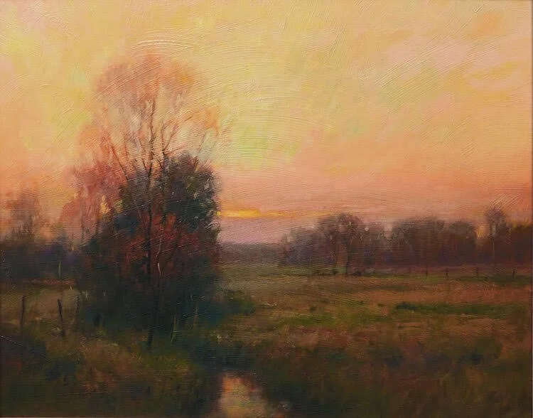 A landscape painting of a sunset over a grassy field with trees and a small creek in the foreground.