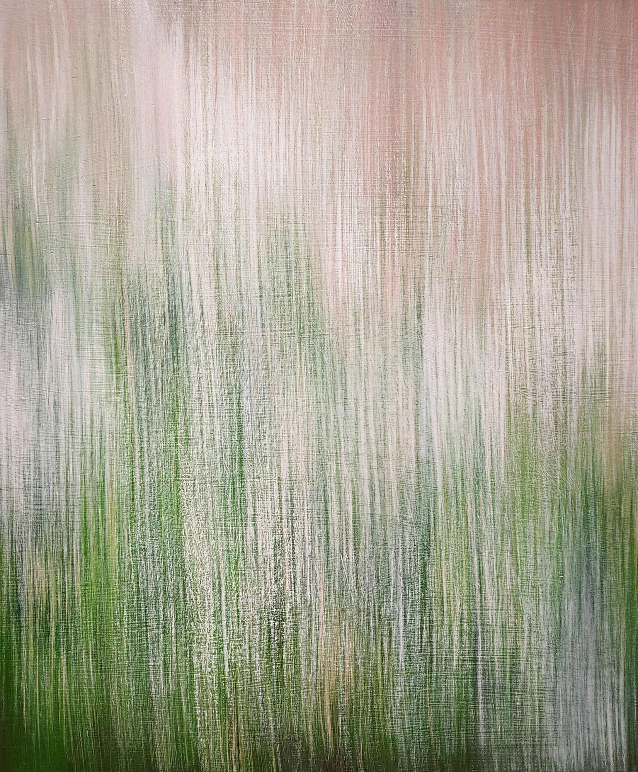 A close-up of a textured surface with vertical streaks of light brown, green, and beige colors.