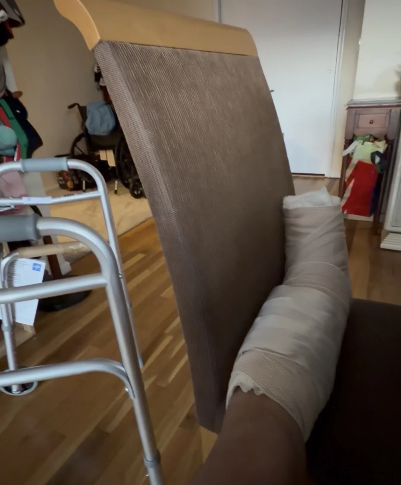 on a cast in the living room post ankle surgery