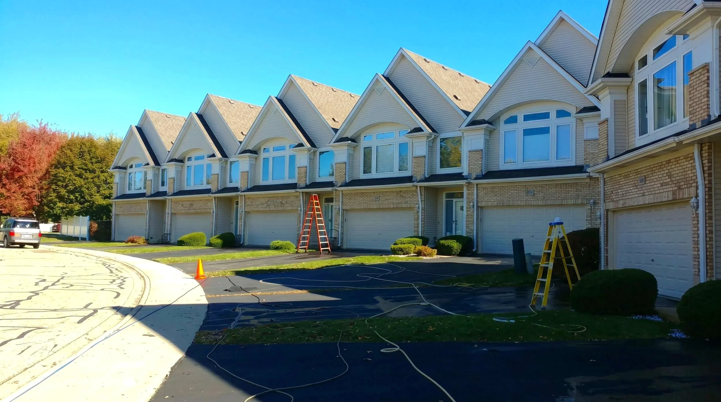 HydroLux exterior cleaning setup at a condominium community