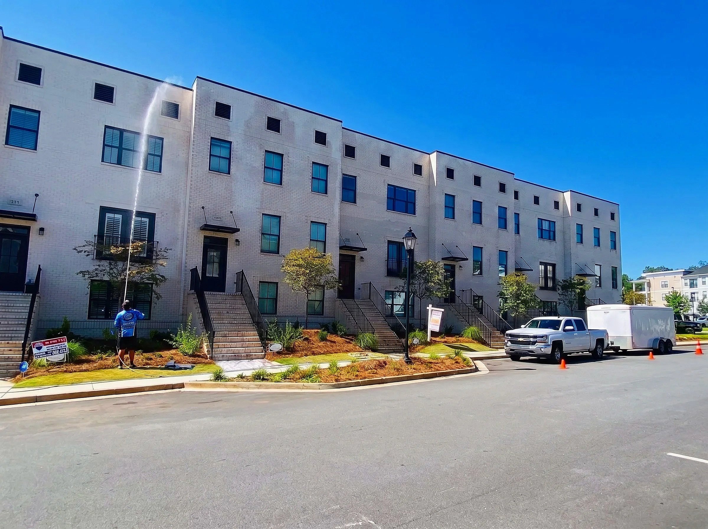 Exterior view of a condominium community maintained with professional property cleaning services