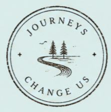 Circular logo with the words 'Journeys Change Us' around the edge, featuring a winding path leading to two trees, with birds flying above.