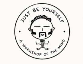 The Jby guy logo with a cartoon character smiling and wearing a stylised sideburns and a beautiful horse shoes moustache , encircled by the text 'Just Be Yourself' on top and 'A Workshop of the Mind' on bottom.