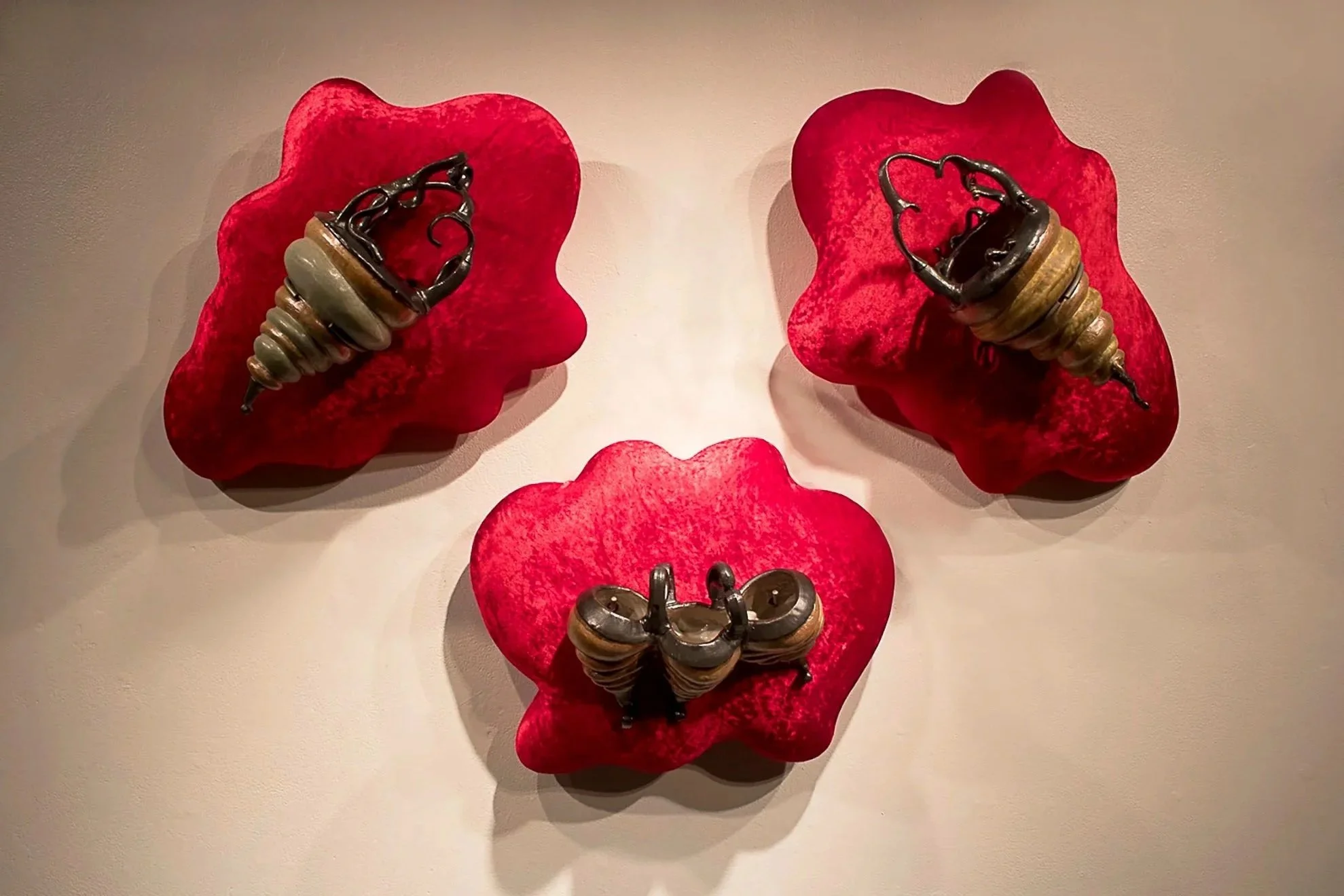 Baskets, ceramic, red velvet, plywood, steel rod, upholstery foam, (largest piece 23 x 29 x 9), 2025