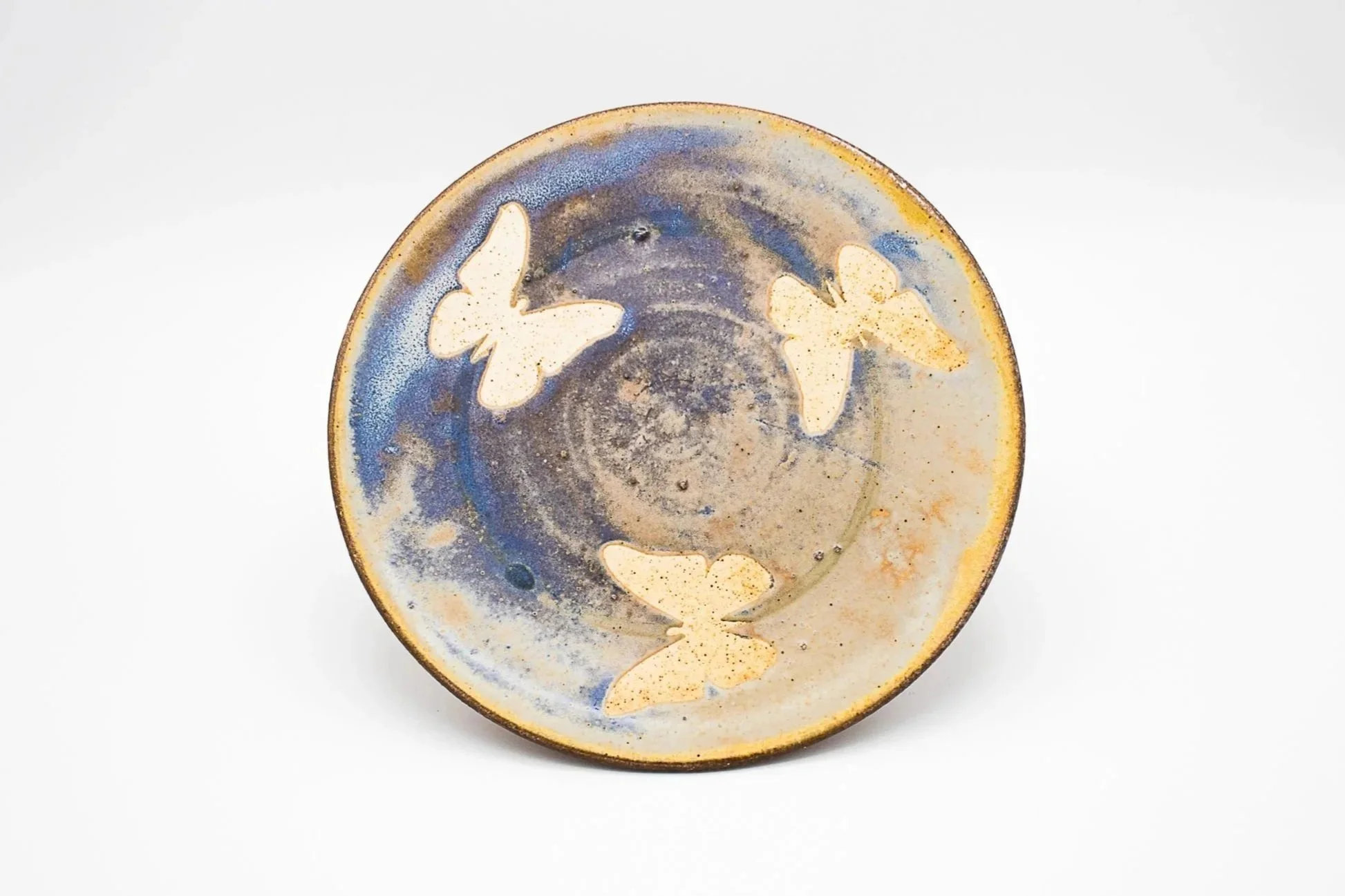 Butterfly Lunch Plate, stoneware, white slip, rutile glaze, soda-fired, (6 x 6 x 1 in), 2022.