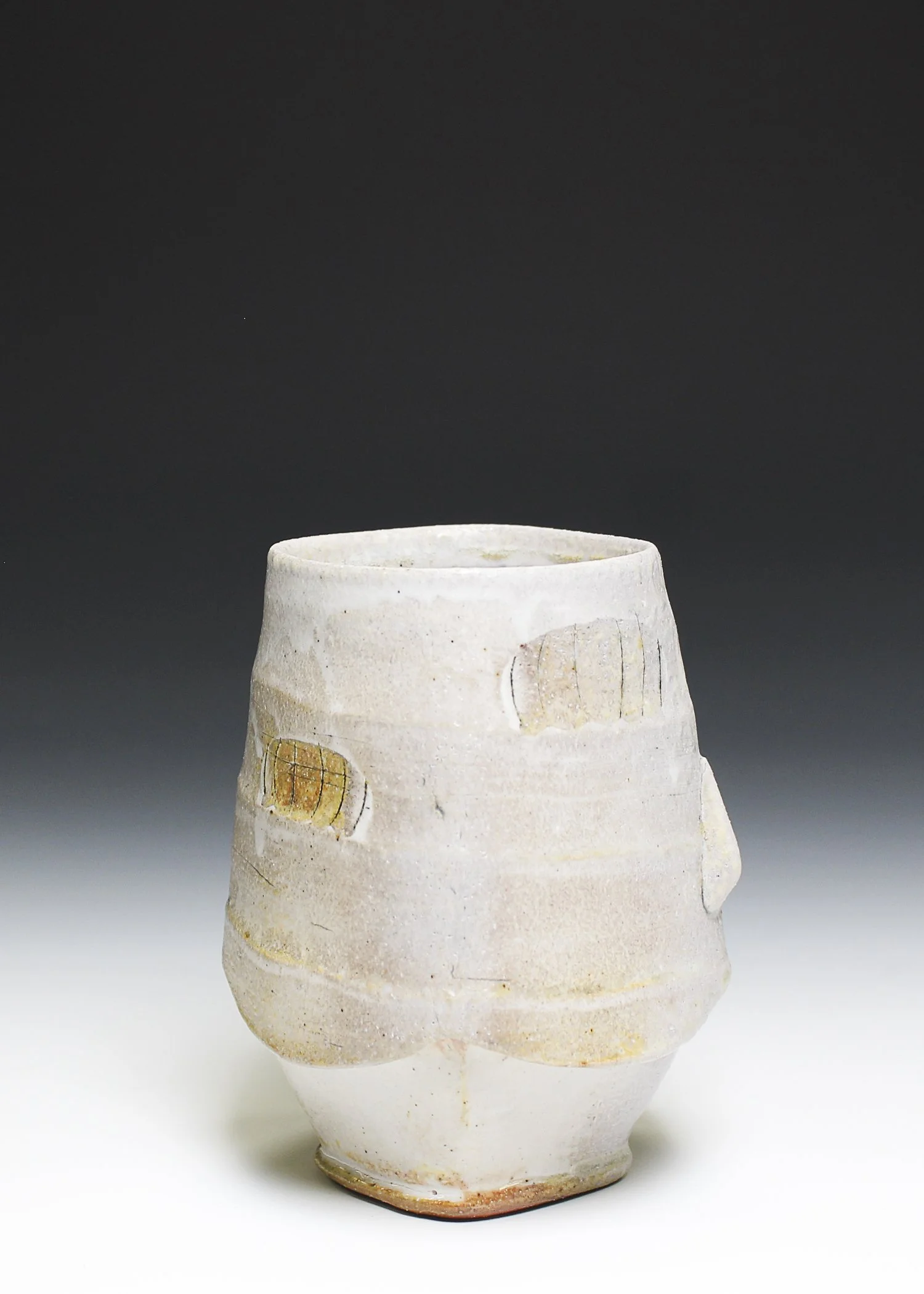Skirted Cup, porcelaneous stoneware, white slip, wood-fired, (4 x 4 x 5 in), 2025.