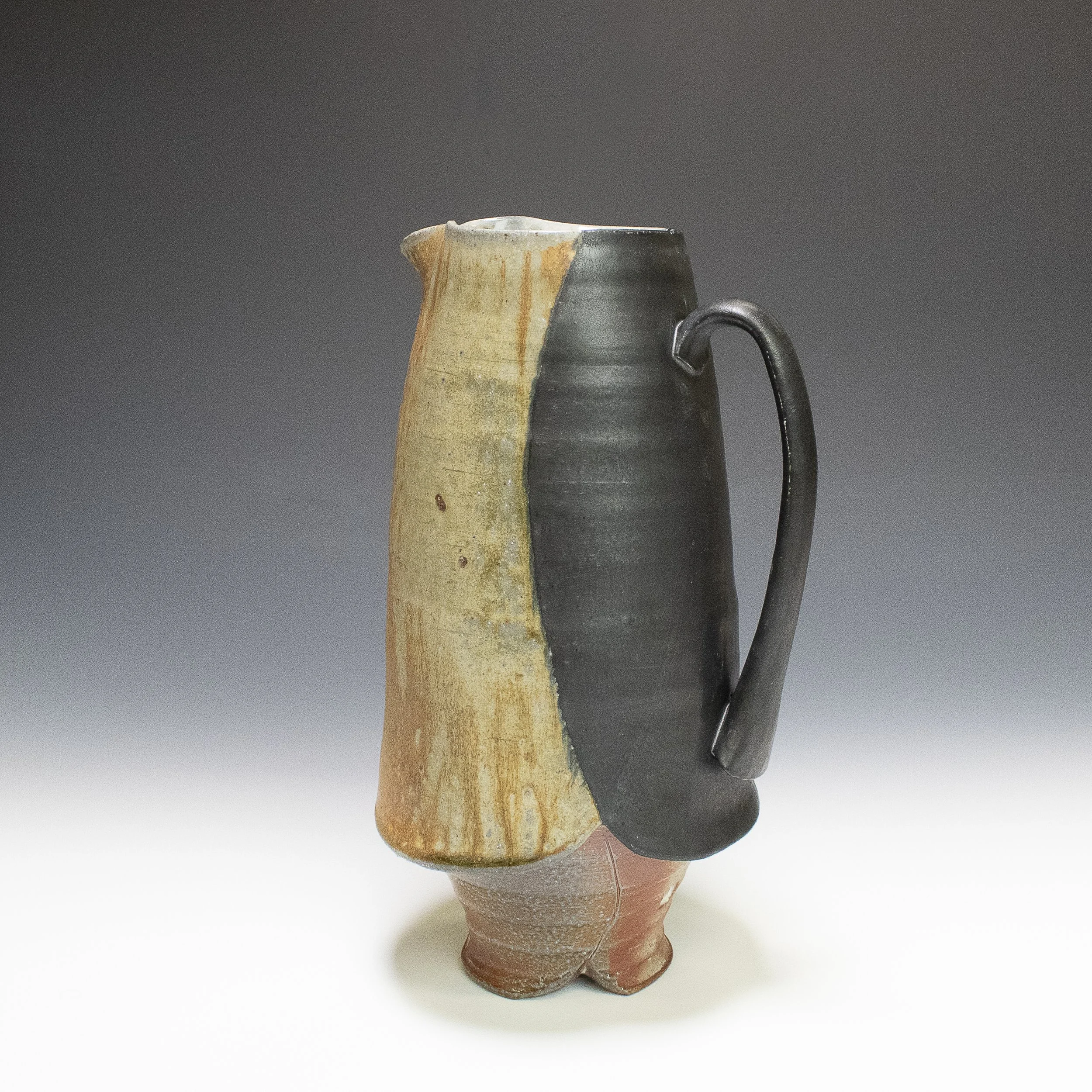Winged Pitcher, stoneware, white slip, ash glaze, soda-fired, (6 x 6 x 14 in), 2024.