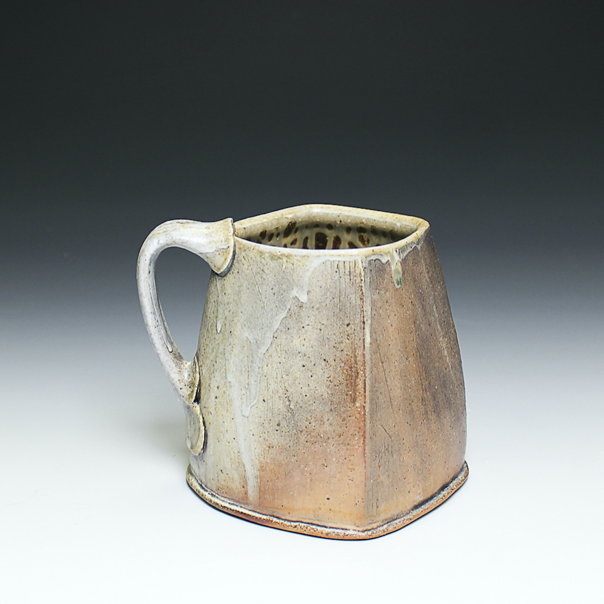 Squared Mug, stoneware, underglaze wash, ash glaze, wood fired, (5 x 5 x 5 in), 2025.