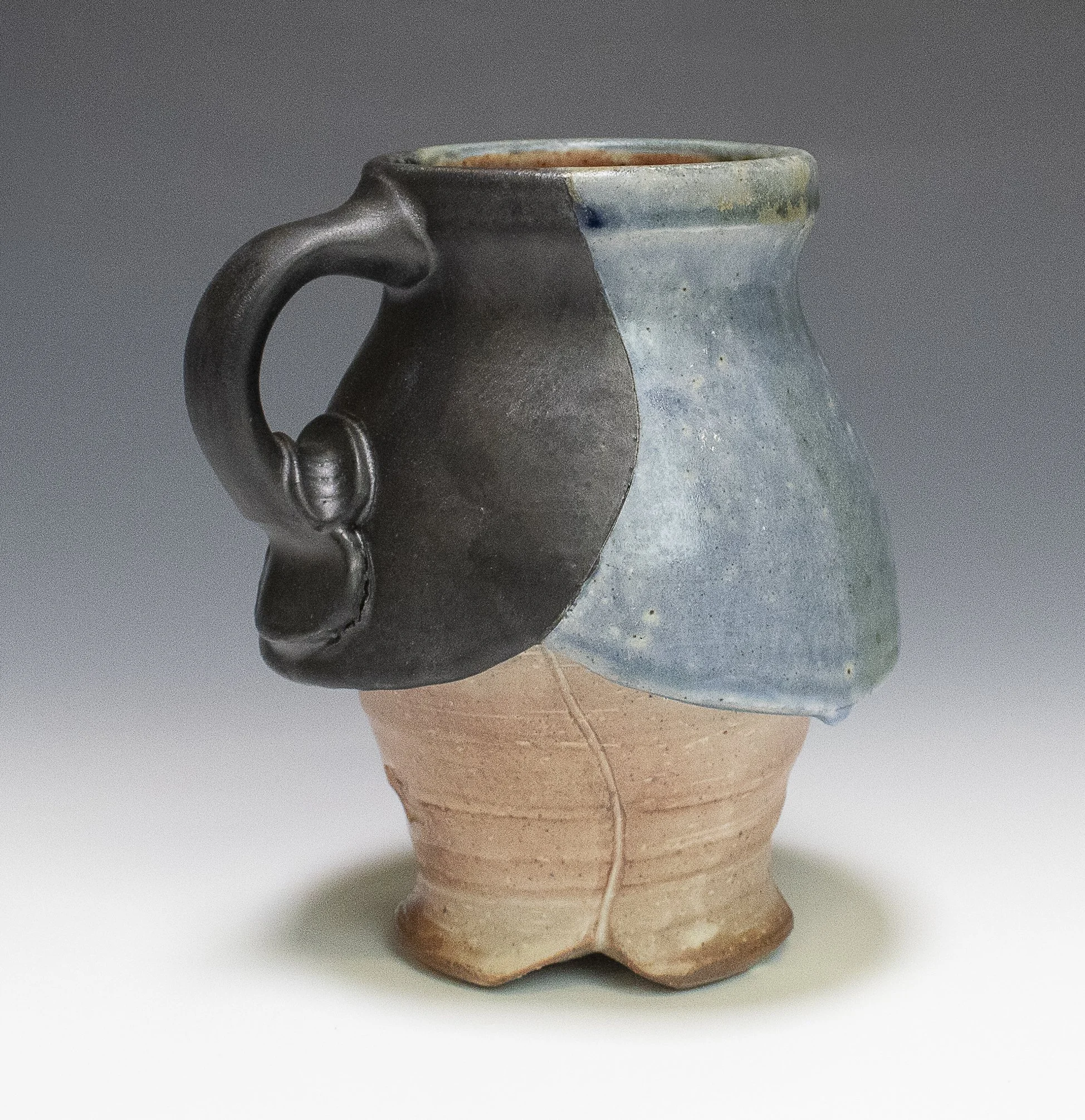 Winged Mug #2, stoneware, white slip, ash glaze, soda-fired, (5 x 5 x 5 in), 2024.