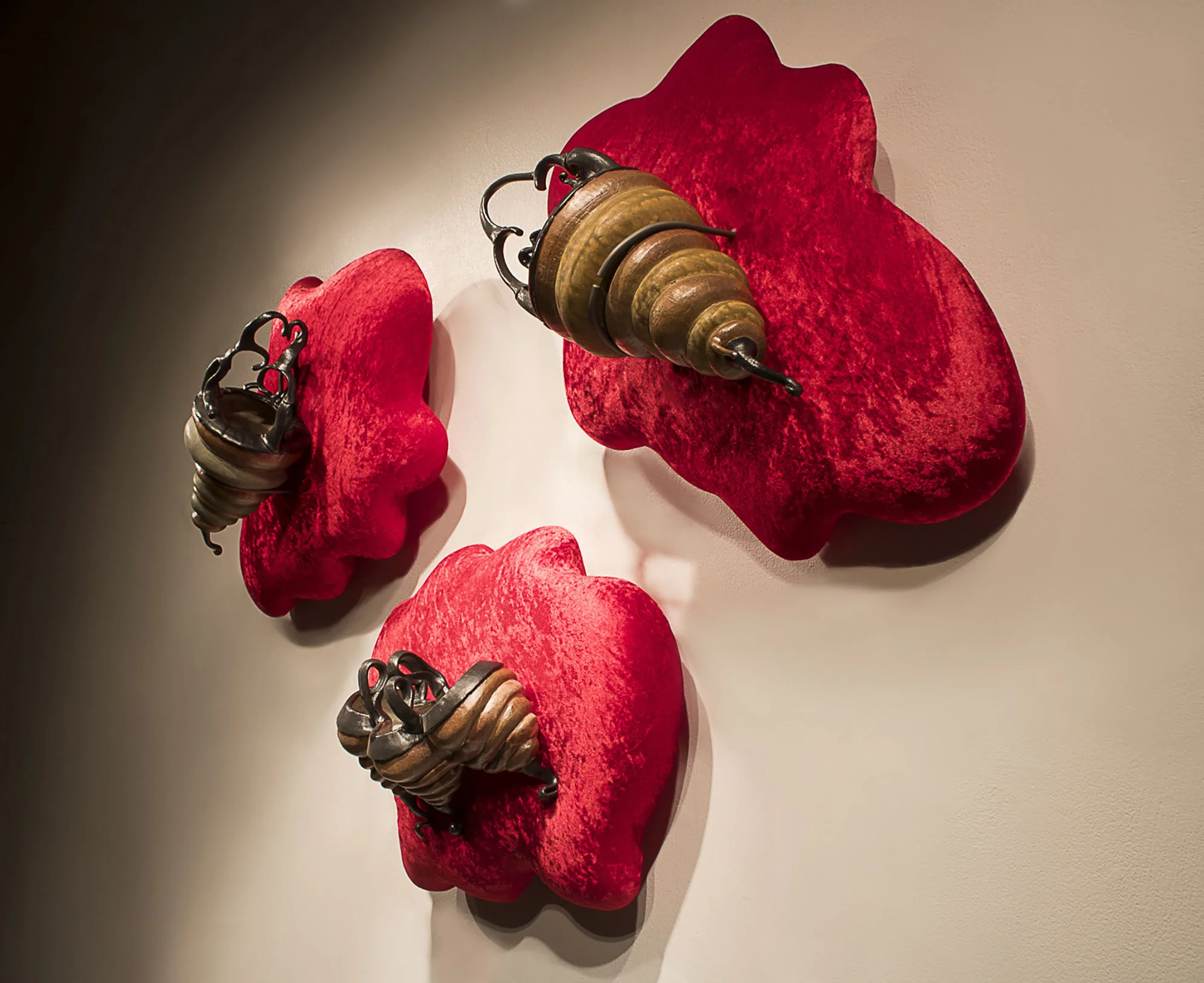 Baskets, ceramic, red velvet, plywood, steel rod, upholstery foam, (largest piece 23 x 29 x 9), 2025