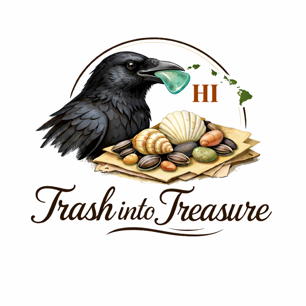 A black crow holding a piece of sea glass in its beak, with various seashells and small rocks on a piece of cloth, and the words 'Trash into Treasure' below.