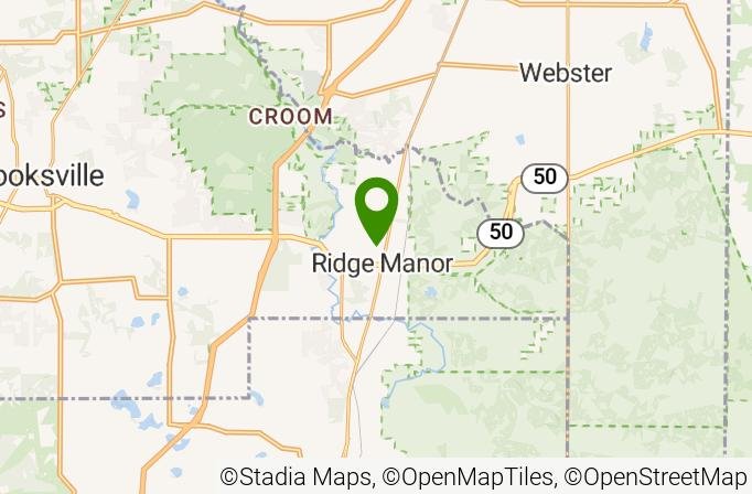 Map showing Ridge Manor in Florida, near crossing of highways 50 and a few local roads, with nearby towns Webster and Brooksville.