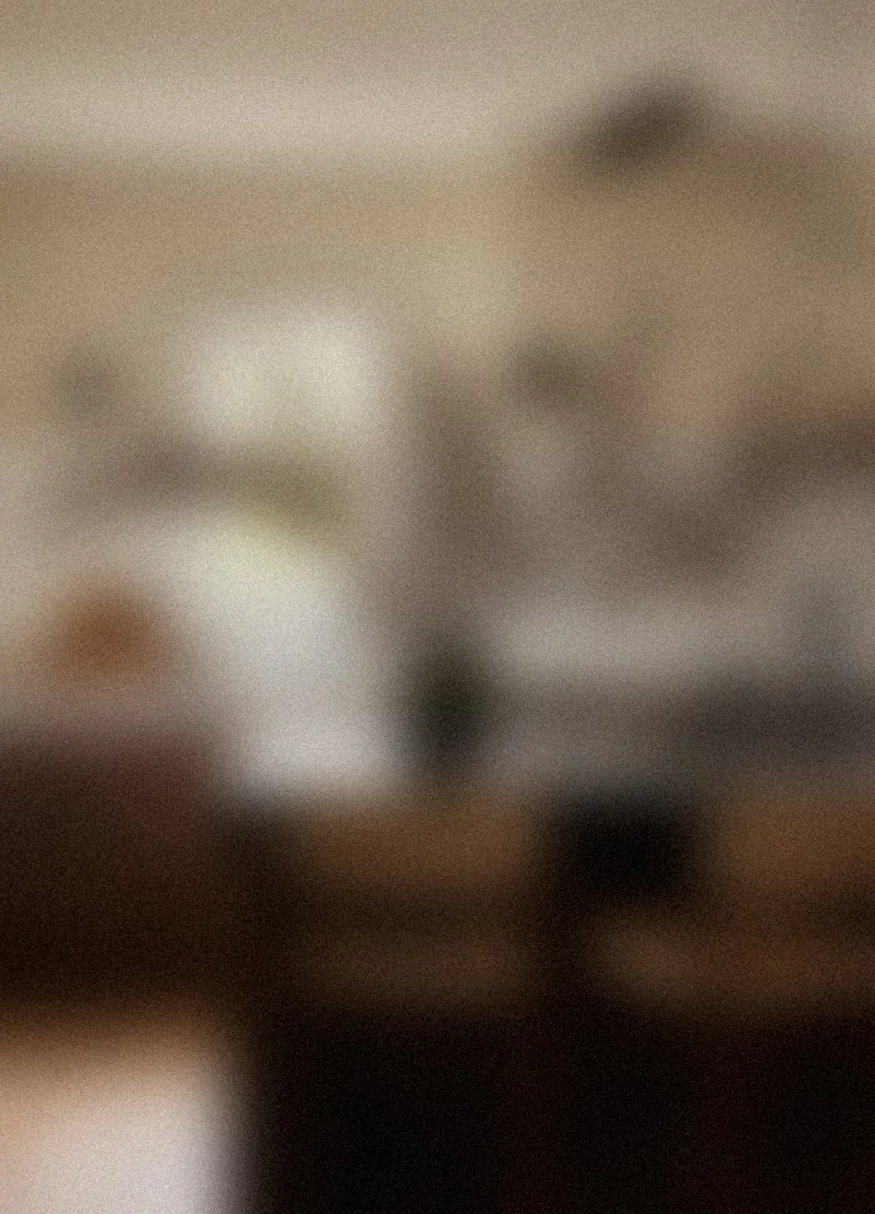 The image is very blurry and indistinct, making it difficult to identify specific objects or details.