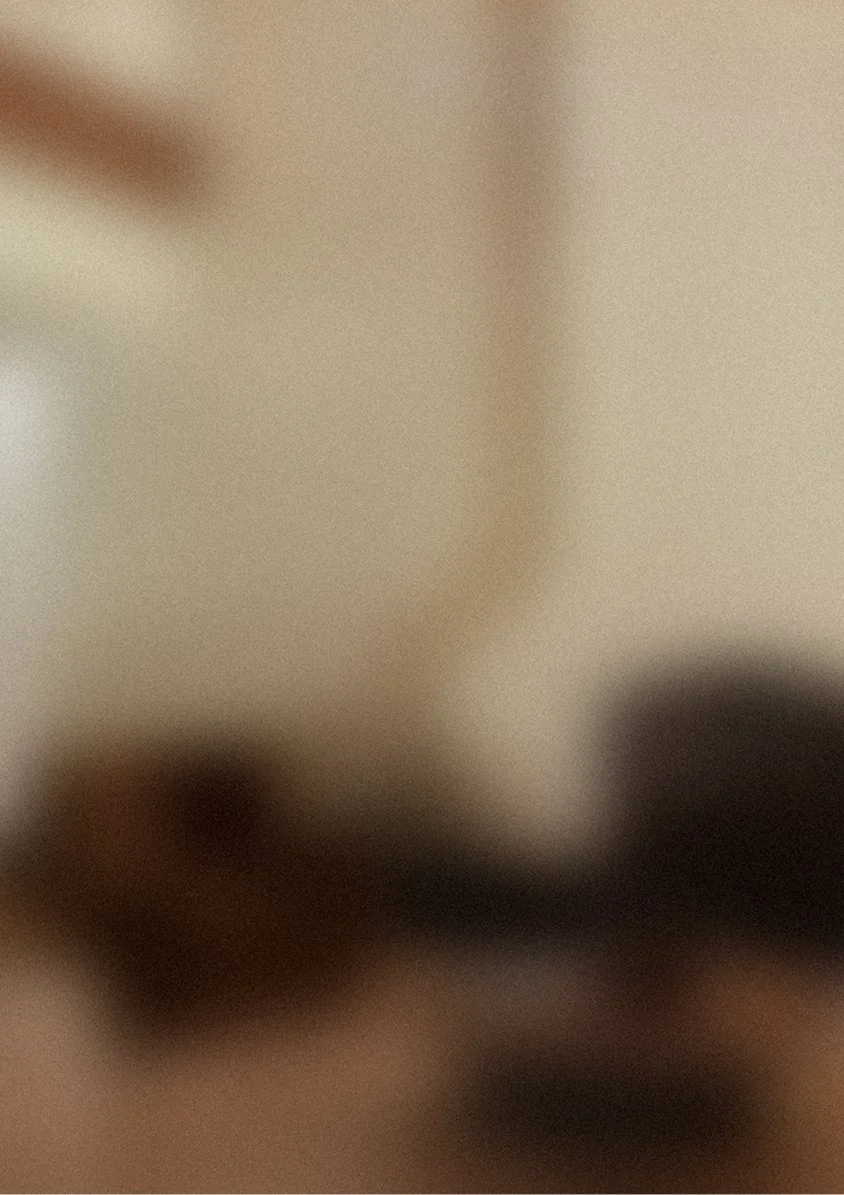 The image is very blurry and unclear, making it difficult to identify specific objects or details.