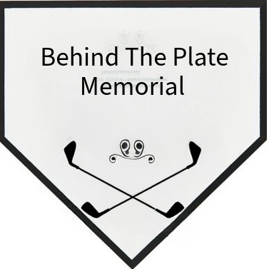 Sign with text 'Behind The Plate Memorial' and a cartoon frog with crossed hockey sticks underneath.