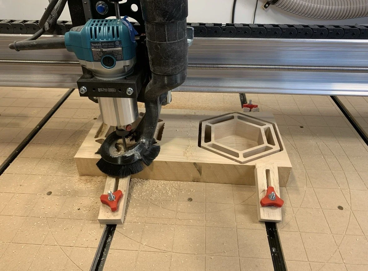 Maple Catan Card Holders being carved.