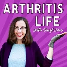 Book cover titled 'Arthritis Life with Cheri Cross' featuring a smiling woman with glasses, dark hair, and a purple cardigan holding a roller.