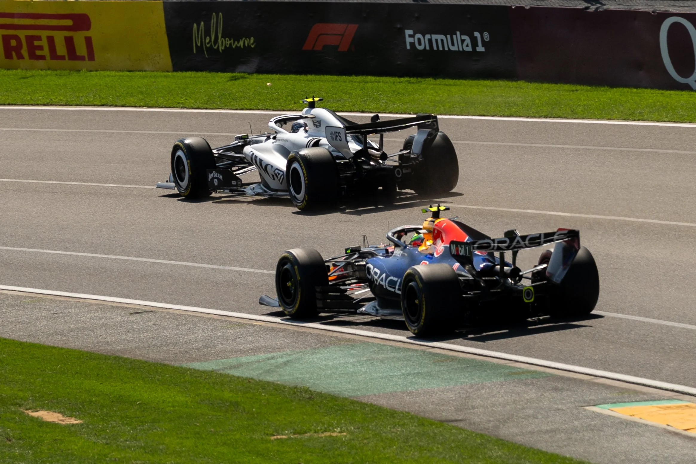Formula 1 race car on a track with Pirelli and McLaren branding visible in the background. red Bull racing f1 Australian Grand Prix 2026 Motorsport photography