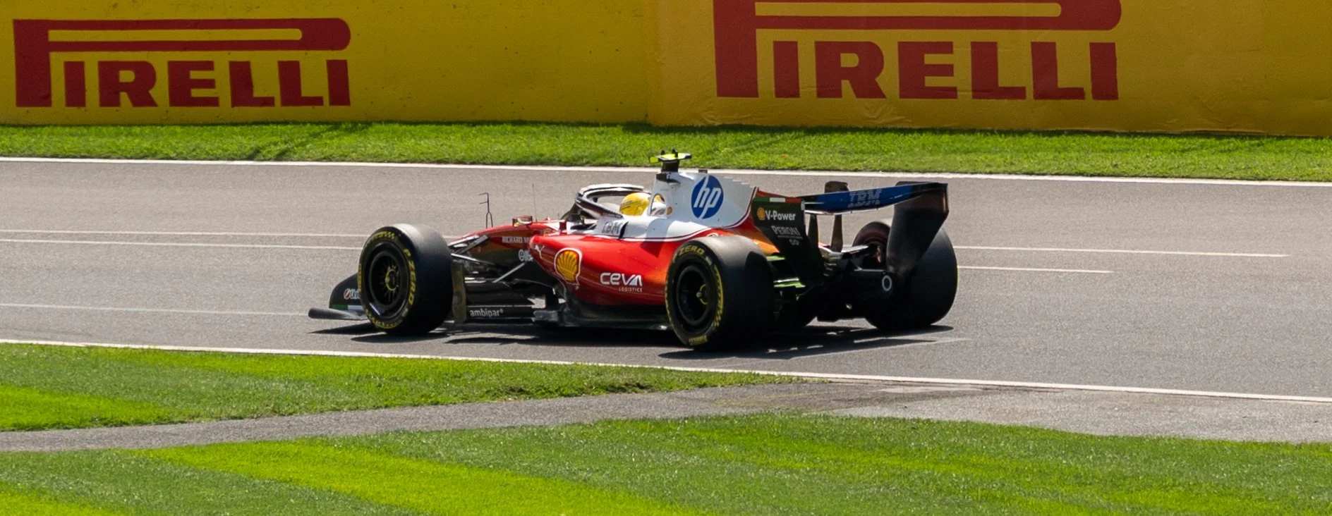 Race car on a track with Pirelli and Shell logos in the background. ferrari formula 1 Lewis Hamilton f1 Australian Grand prix 2026