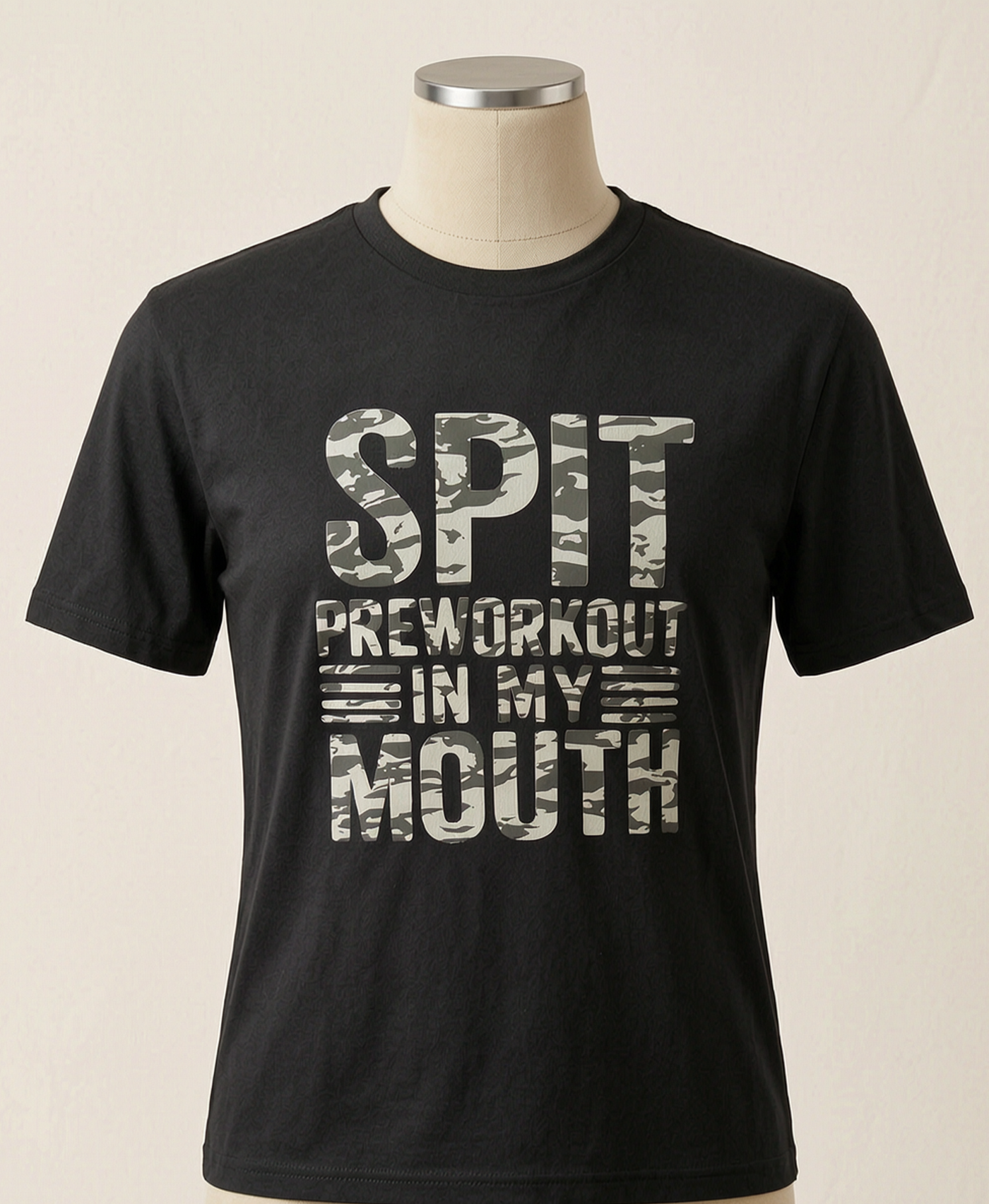 Black T-shirt with the words "SPRT PREWORKOUT IN MY MOUTH" in white with gray camouflage pattern on a mannequin torso.