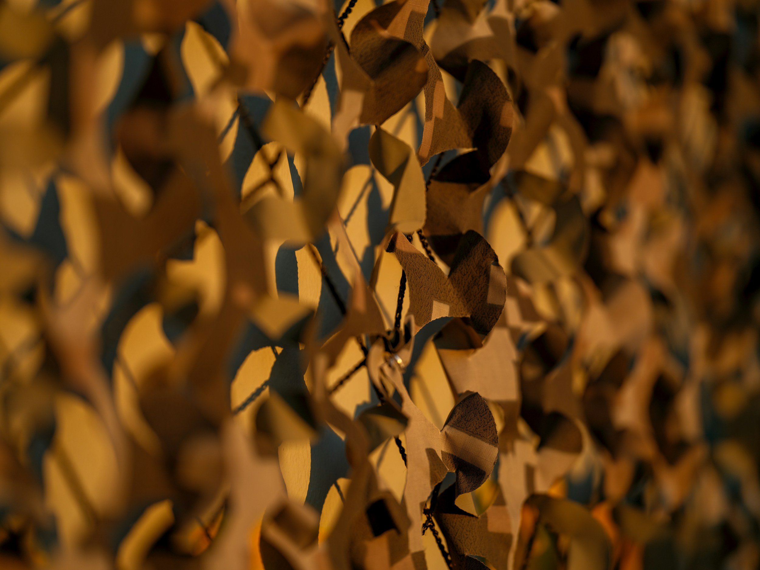 Close up of camouflaged netting.