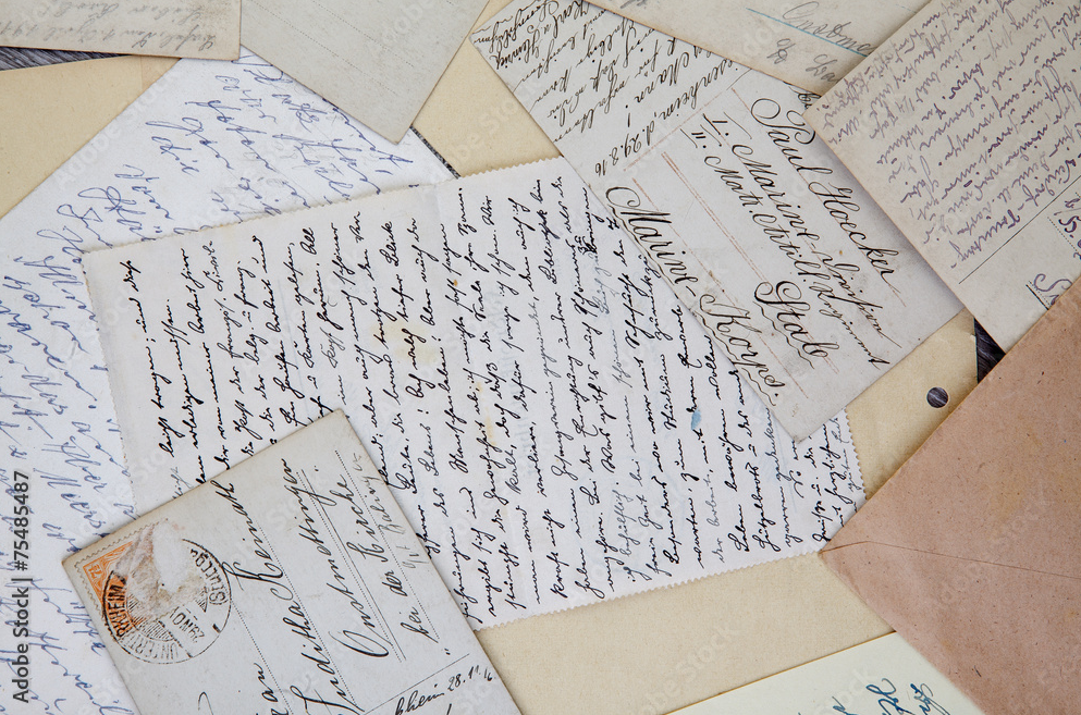Stack of old love letters and postcards