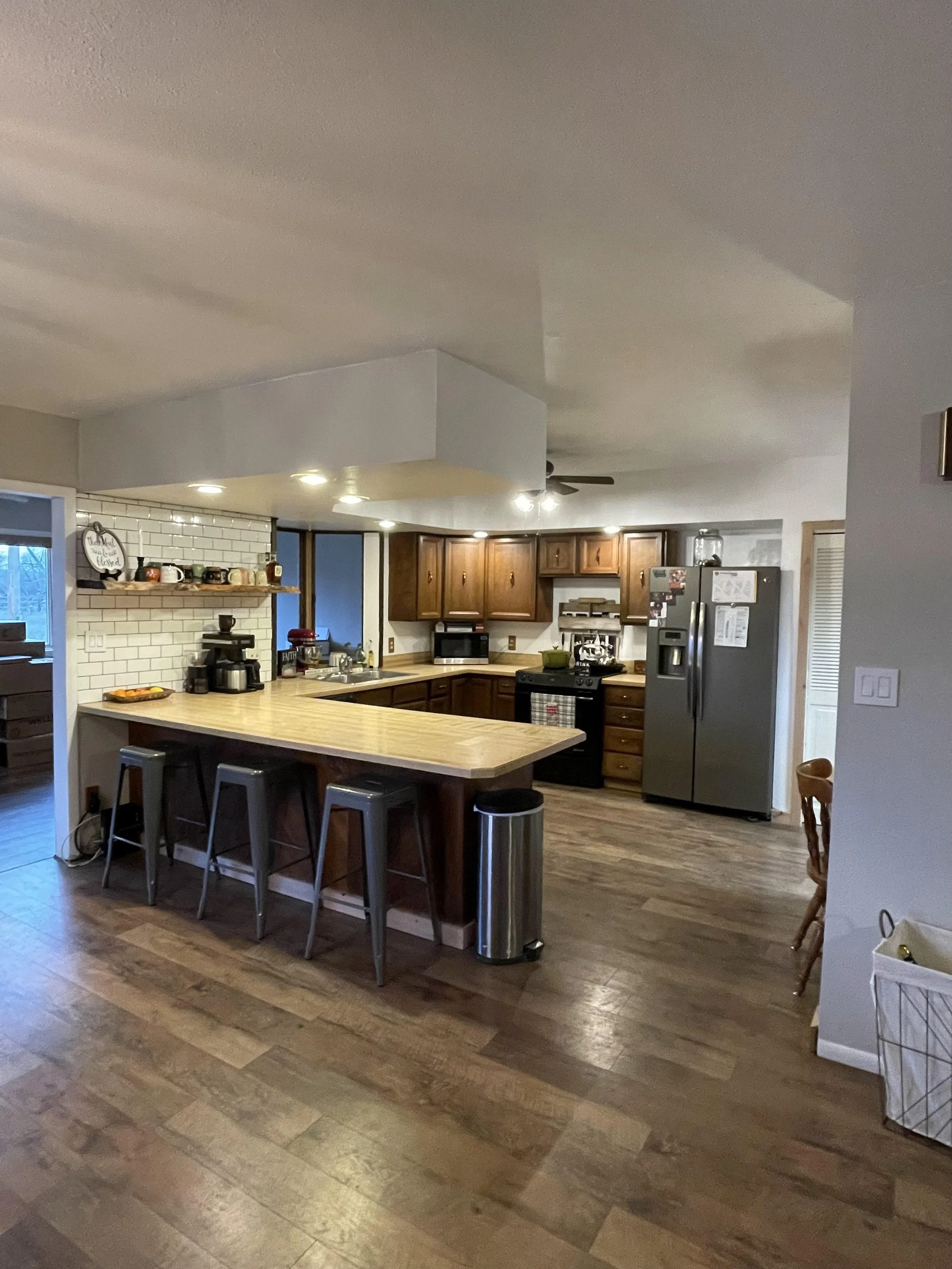 Clean kitchen island with wiped surface and clutter-free countertop.
